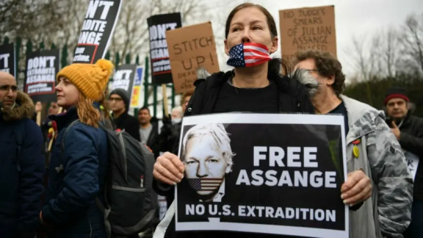 Revised headline: President Biden weighing Australian request to halt Assange case